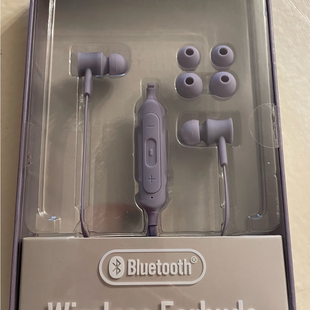 Wireless Bluetooth Earbuds in Purple-Brand New. Sealed.